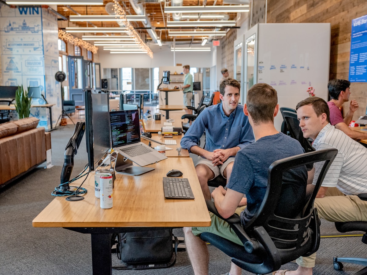 Buyer and sourcing team reviewing product requirements